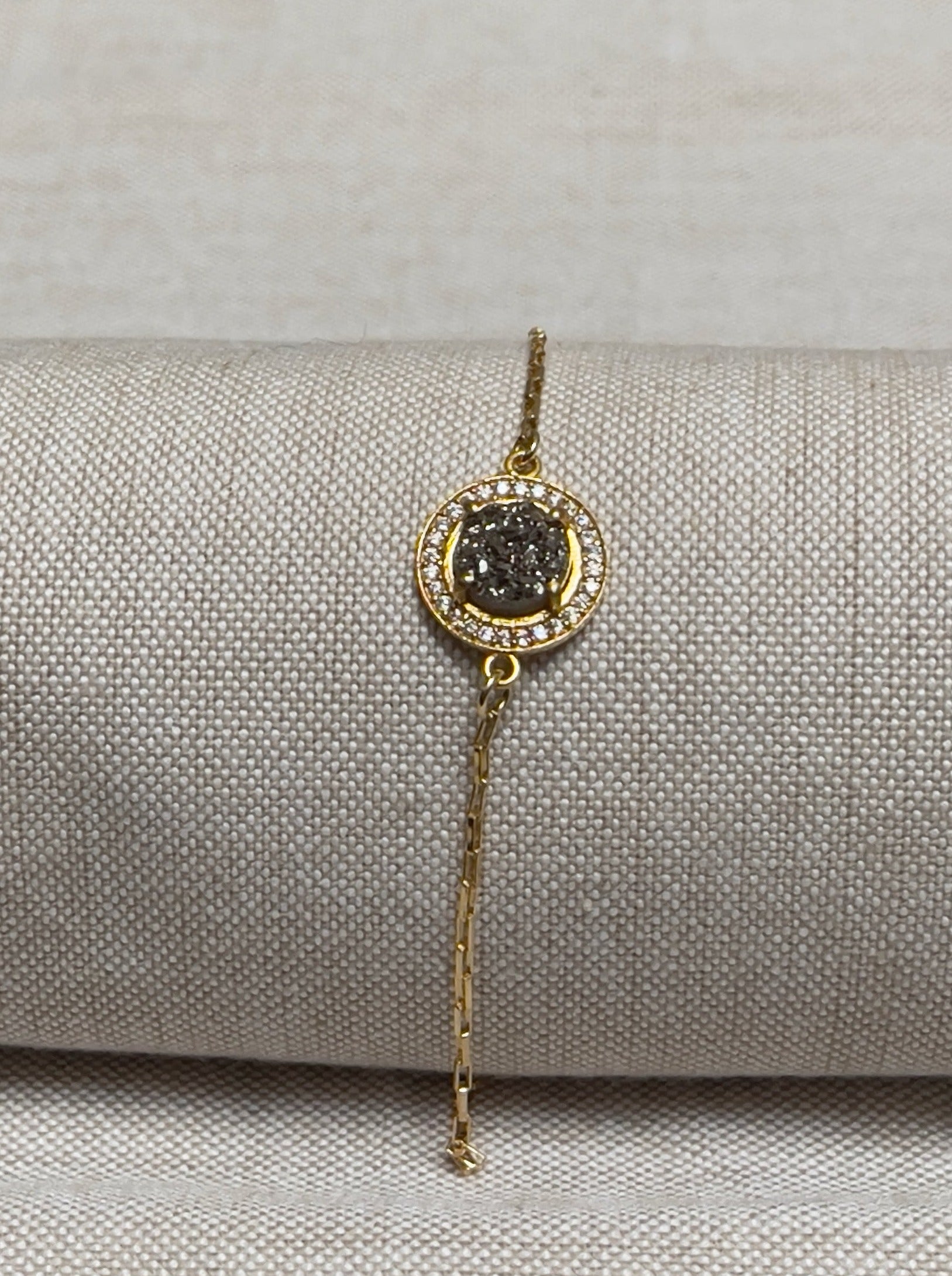Image of bracelet. Chain Type: Elongated venetian Chain Thickness: 1.2 mm Clasp: Lobster Chain: 12k Gold-filled Charm: Gray druzy made of gold vermeil with CZ micro-pave