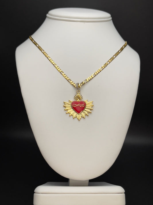 Image of necklace with a red enamel sacred heart pendant.  
