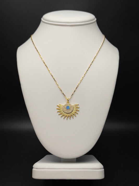 Image of necklace with opal sunburst charm.