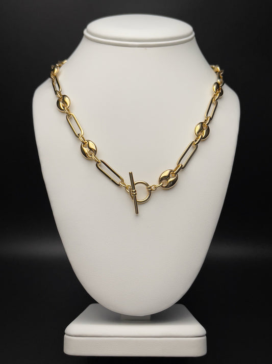 Image of necklace made with puffy mariner and paperclip chain.  