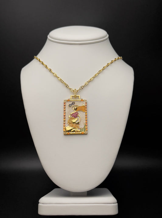 Image of necklace with pearlized enamel tarot card pendant.  